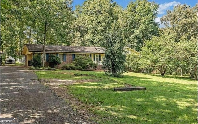 view of front of house with a front lawn