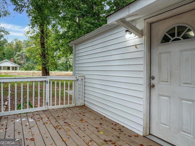 doorway to property with a deck