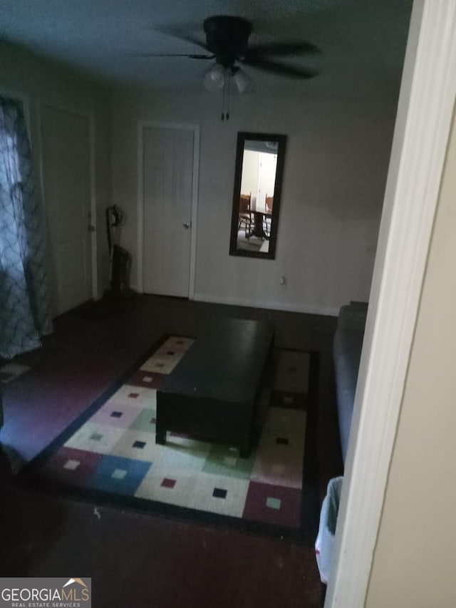 living room with ceiling fan