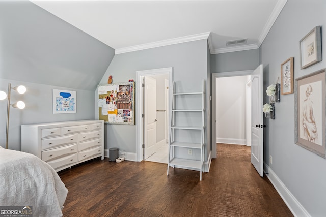 bedroom with connected bathroom, crown molding, lofted ceiling, and dark hardwood / wood-style floors