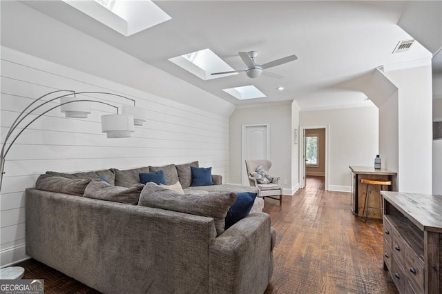 living room with lofted ceiling, crown molding, and dark hardwood / wood-style flooring