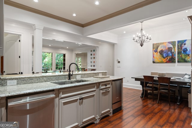 kitchen featuring sink, light stone countertops, dishwasher, and dark hardwood / wood-style flooring