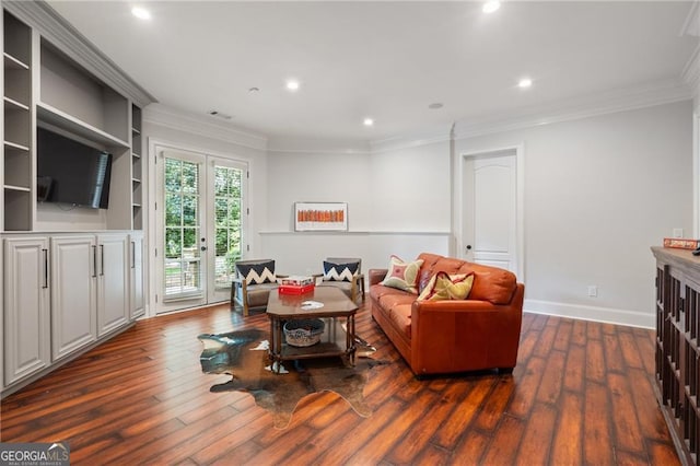 living room with ornamental molding and dark hardwood / wood-style flooring