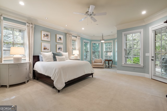 carpeted bedroom featuring crown molding, access to outside, and ceiling fan