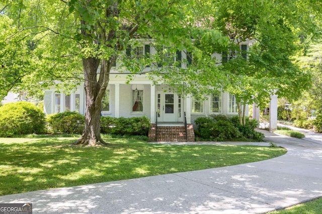 view of front of home with a front yard