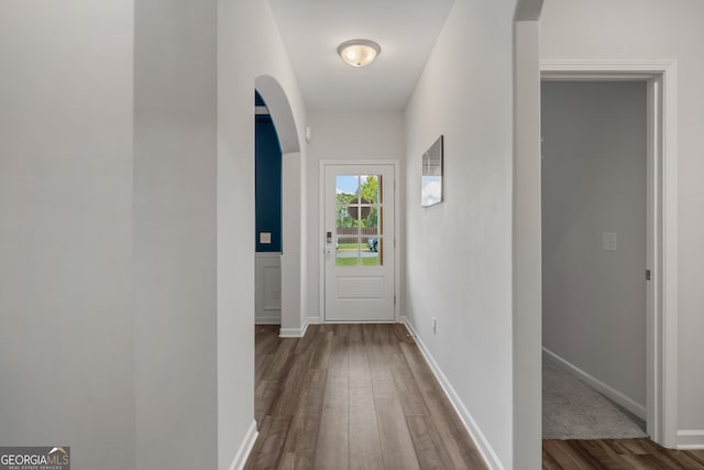 corridor featuring hardwood / wood-style flooring