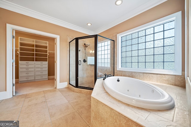 bathroom with ornamental molding, plenty of natural light, tile patterned floors, and separate shower and tub