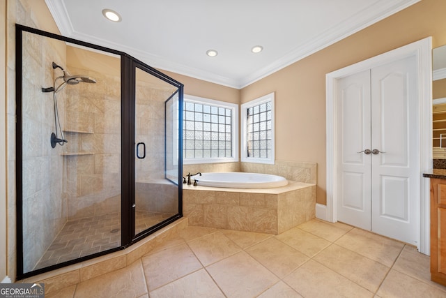 bathroom featuring vanity, separate shower and tub, tile patterned flooring, and ornamental molding