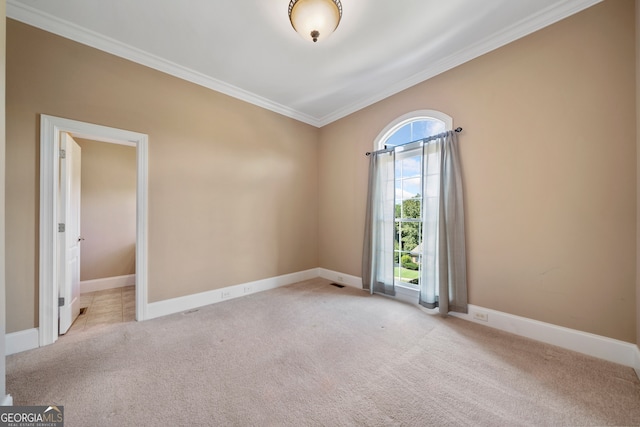 carpeted empty room with ornamental molding