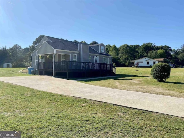 exterior space with a front yard and a deck