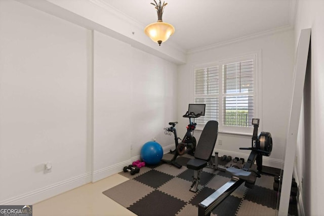 exercise room with ornamental molding