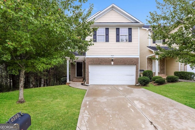 view of front of house with a front lawn and a garage