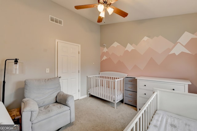 carpeted bedroom with ceiling fan