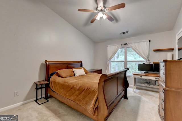 carpeted bedroom featuring ceiling fan and lofted ceiling