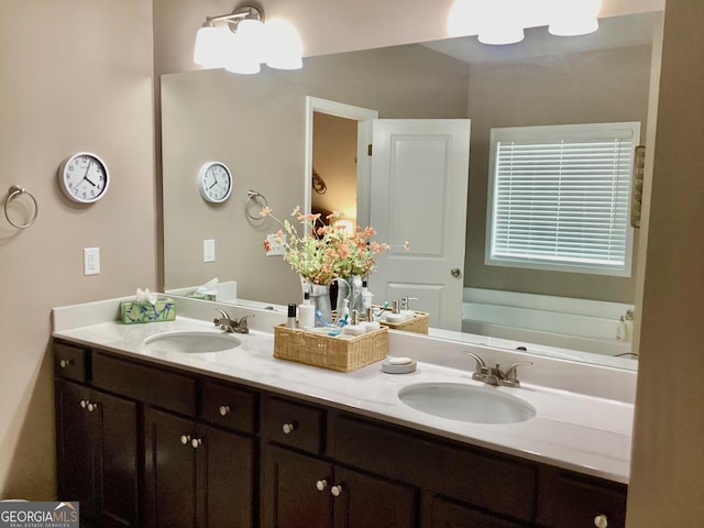 bathroom featuring vanity and a bathing tub