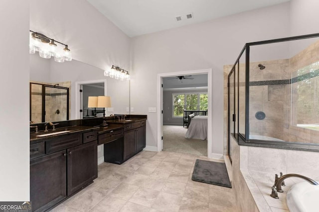 bathroom featuring tile patterned floors, vanity, separate shower and tub, and ceiling fan