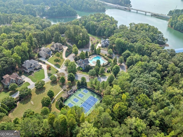 bird's eye view with a water view