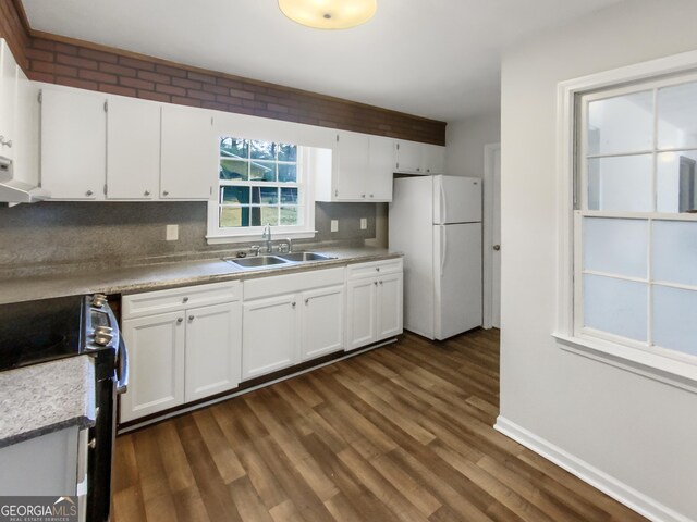 spare room featuring a textured ceiling, dark hardwood / wood-style flooring, and ceiling fan