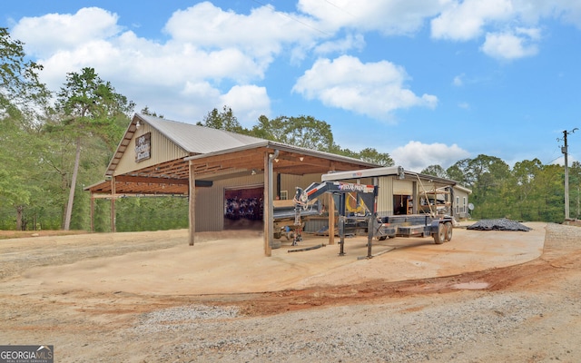 view of home's community featuring an outdoor structure