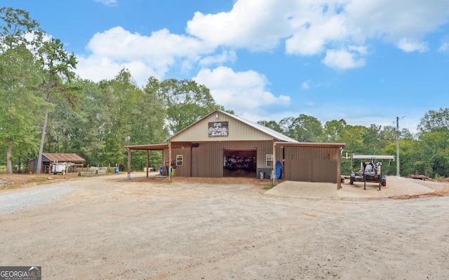 view of outbuilding featuring a garage