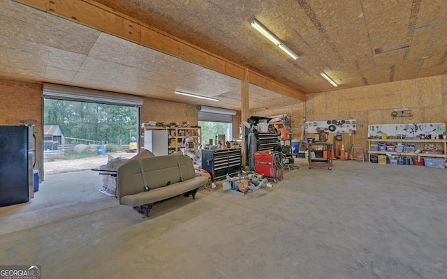 garage with a workshop area