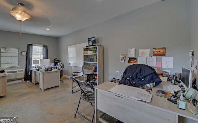 office area featuring a wall unit AC and ceiling fan