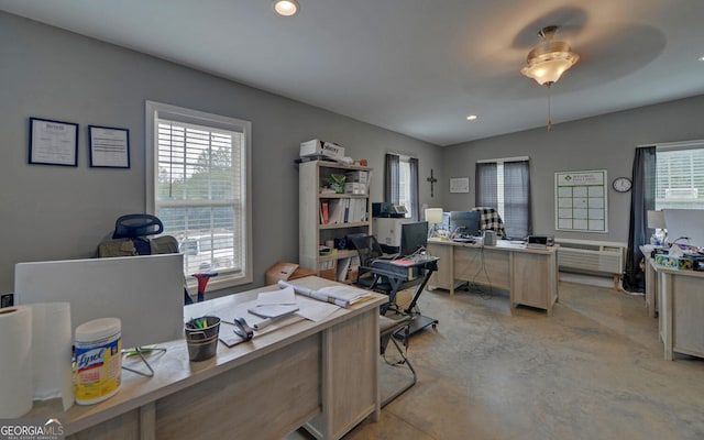 office space with ceiling fan