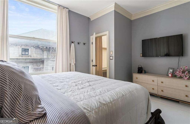 bedroom featuring ornamental molding