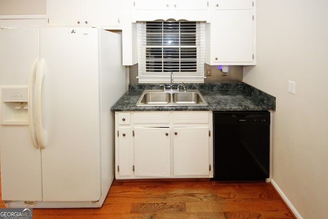 kitchen featuring sink, dark wood-type flooring, white cabinetry, dishwasher, and white refrigerator with ice dispenser