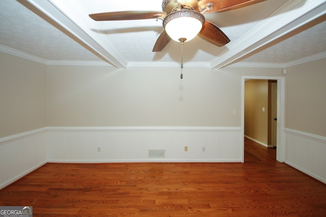 empty room featuring ornamental molding, ceiling fan, dark hardwood / wood-style floors, and a textured ceiling