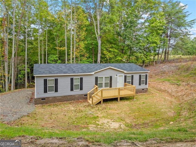 view of front of house featuring a deck