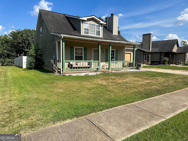 view of front of property featuring covered porch and a front yard