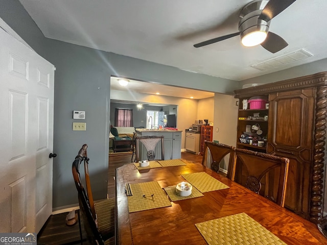 dining room with ceiling fan