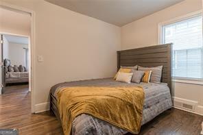 bedroom featuring dark hardwood / wood-style floors