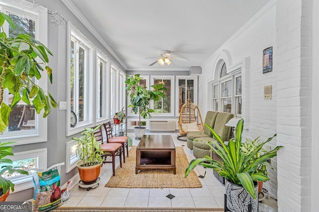 sunroom with ceiling fan