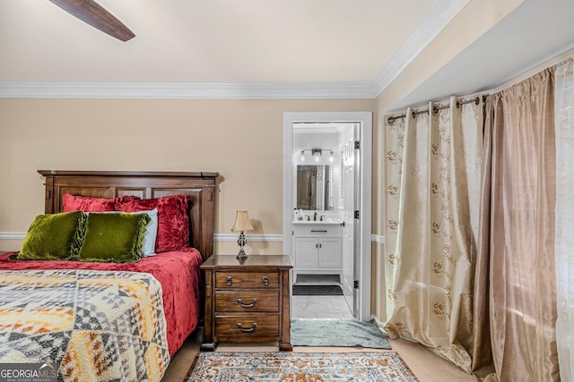 bedroom featuring crown molding, ceiling fan, and ensuite bathroom