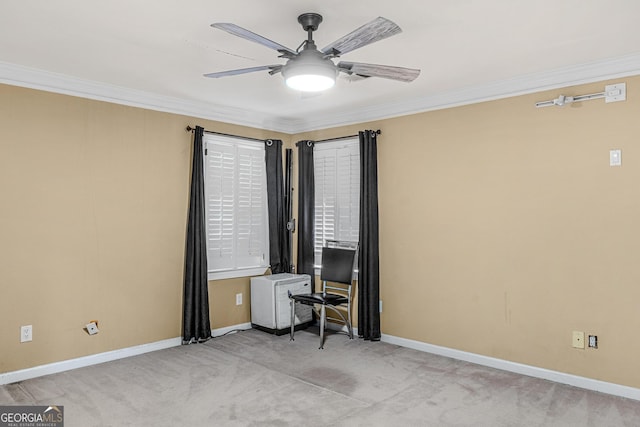 unfurnished bedroom featuring ornamental molding, ceiling fan, and light colored carpet