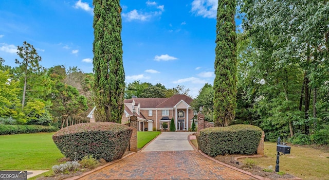 view of front of property with a front lawn