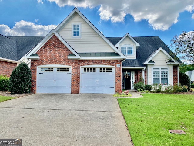 craftsman-style home with a garage and a front lawn