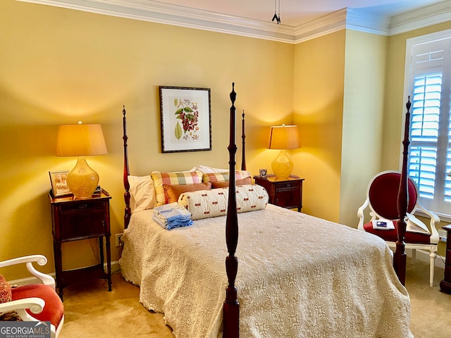 bedroom with carpet floors and ornamental molding