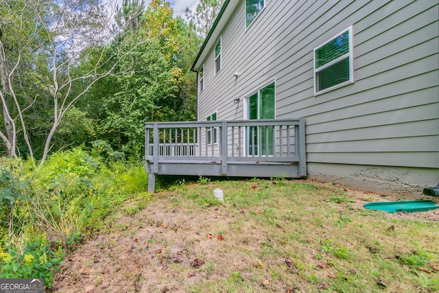 view of home's exterior with a deck