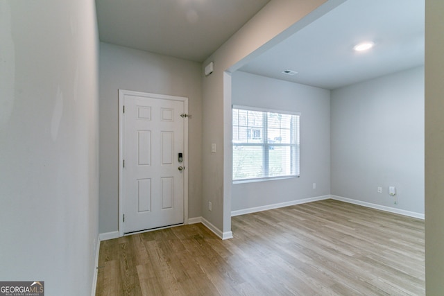 entrance foyer with light hardwood / wood-style flooring