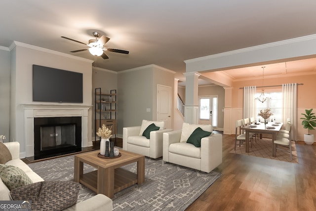 living room featuring ceiling fan, dark hardwood / wood-style floors, and crown molding