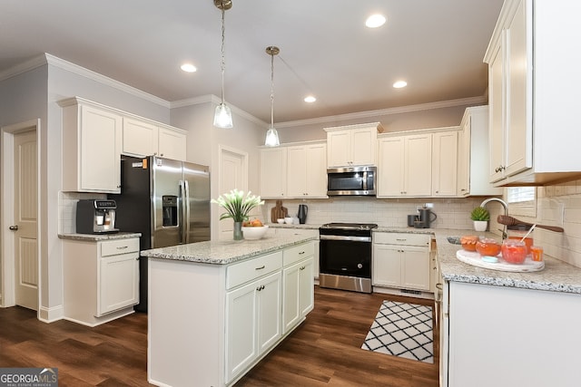 kitchen featuring pendant lighting, stainless steel appliances, a kitchen island, and dark hardwood / wood-style flooring