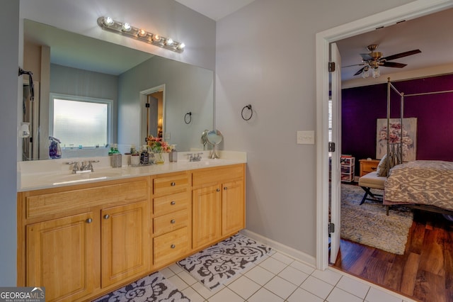 bathroom with vanity, ceiling fan, and tile patterned floors