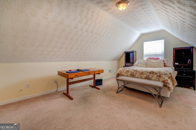 carpeted bedroom featuring vaulted ceiling