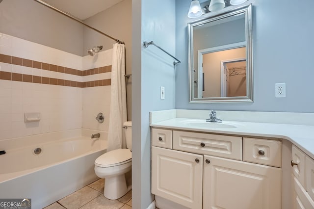 full bathroom featuring toilet, tile patterned flooring, vanity, and shower / bathtub combination with curtain