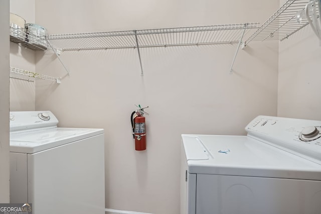 laundry room featuring separate washer and dryer