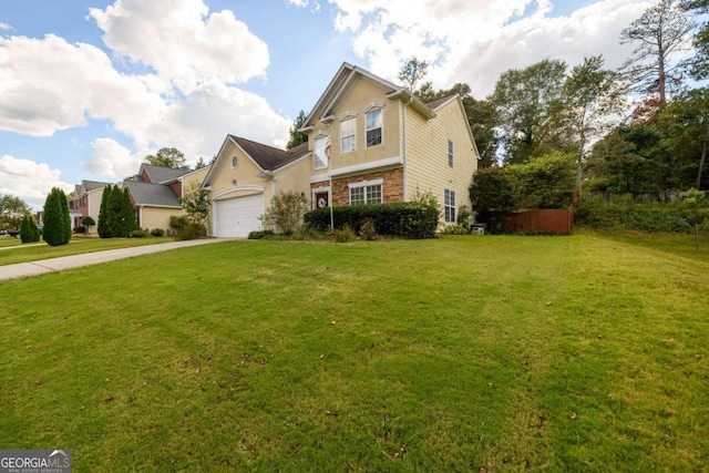 front facade with a garage and a front yard