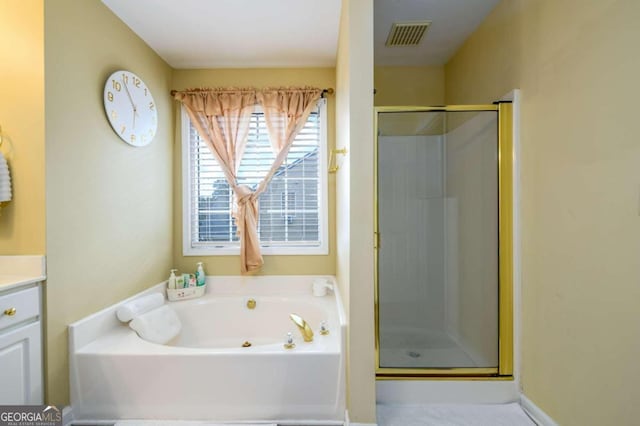 bathroom with vanity and plus walk in shower